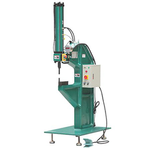 Pneumatic riveting machine